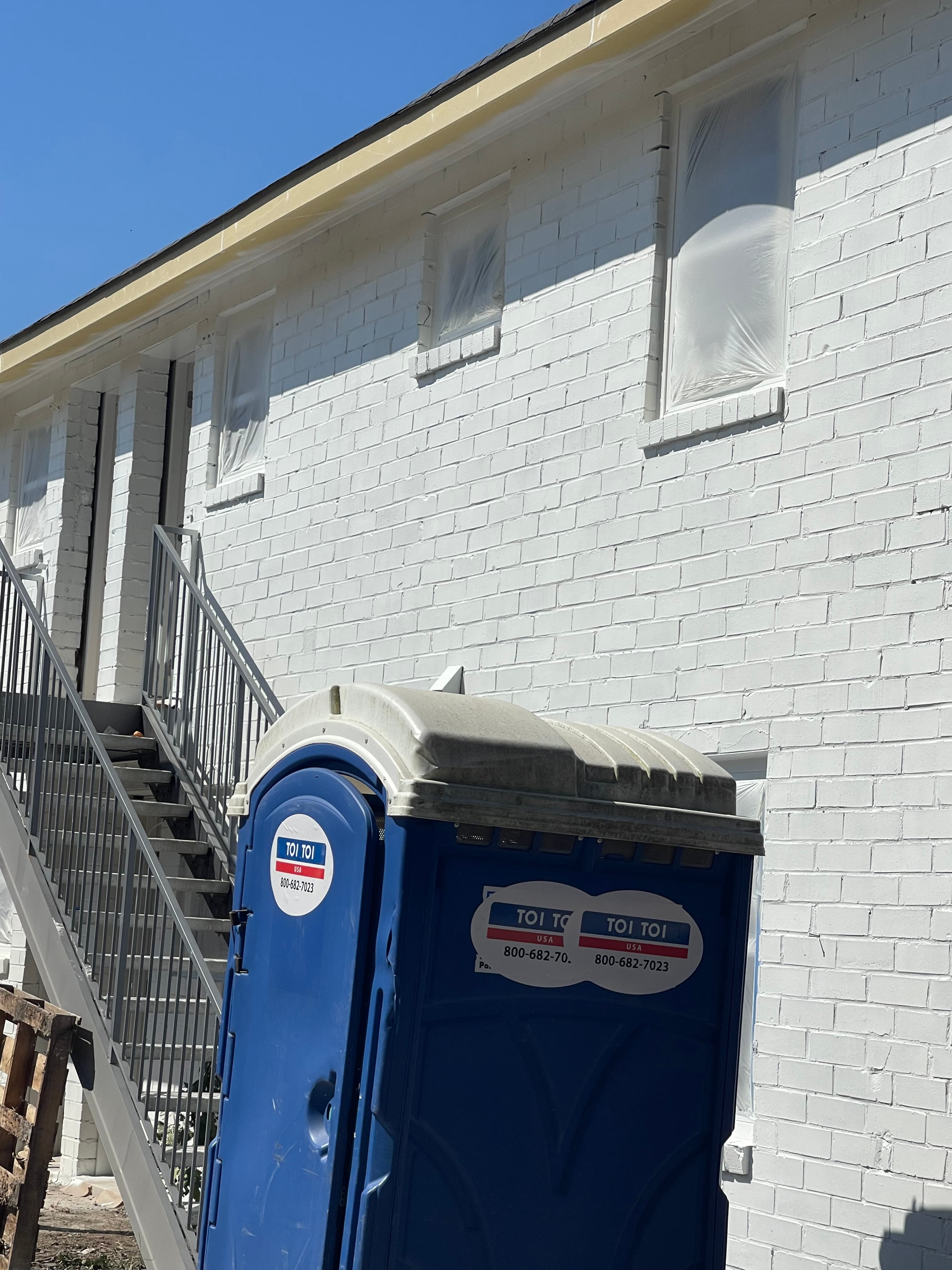 Residential Exterior with Window Protection