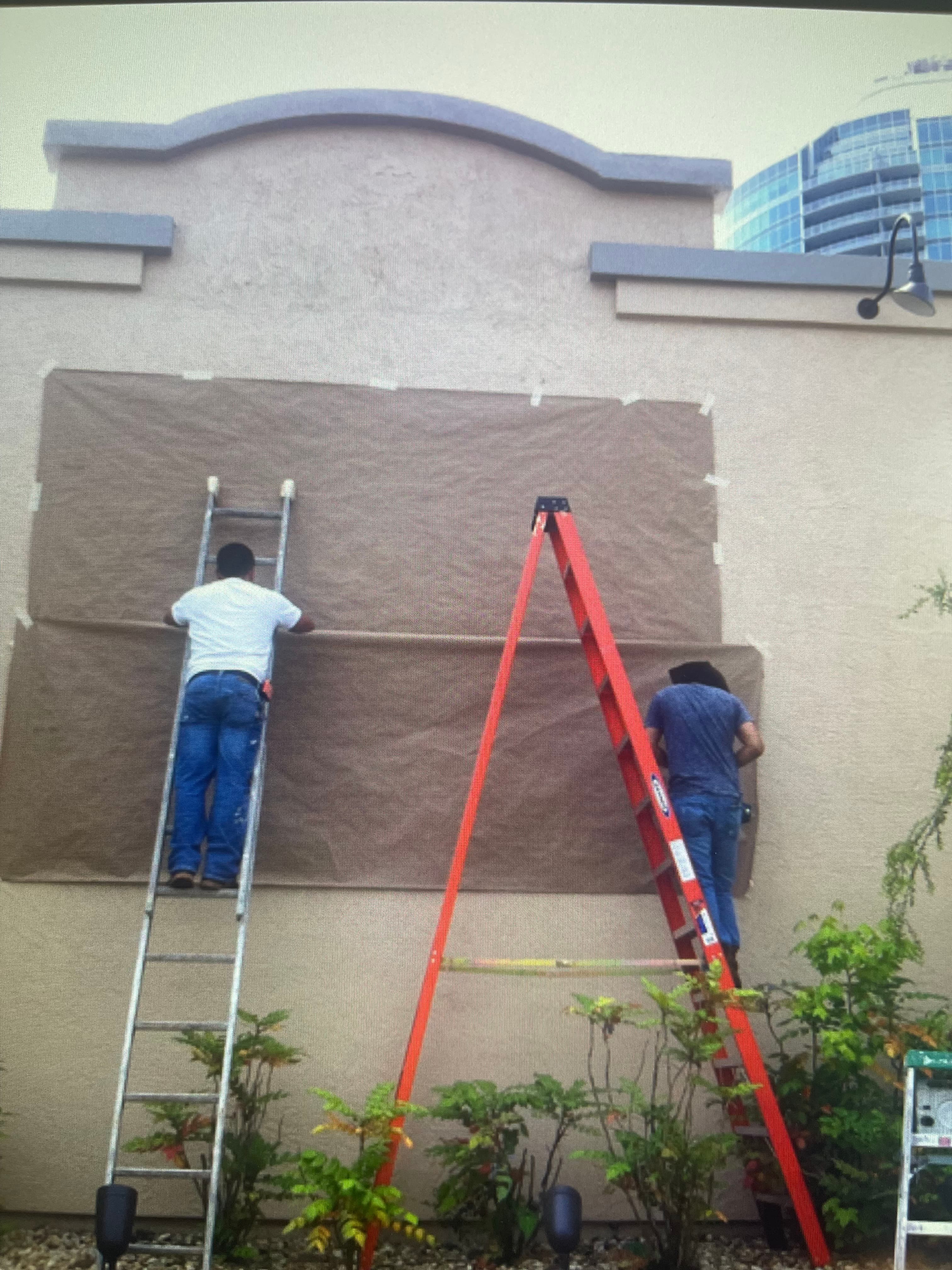 Brick Wall Protective Covering Installation